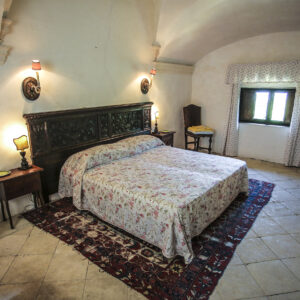 Rocca Pisana, camera da letto. Foto dal sito della villa